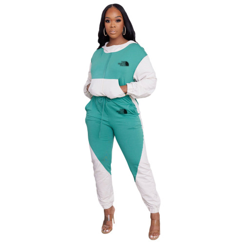 Splicing and contrasting color semi high neck hooded sports suit