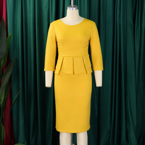 Round neck ruffled solid color hip hugging dress