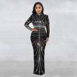 Women's long sleeved back slit hot stamping dress