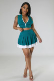 Two piece set of sleeveless cardigan, vest, exposed navel skirt