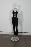 Hanging neck tie and backless jumpsuit