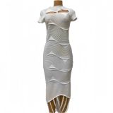 Slant neck tassel hollow out knitted irregular short sleeved dress