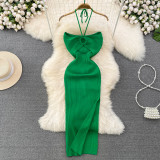 Hanging neck hollow backless sleeveless mid length slit hip hugging knitted dress