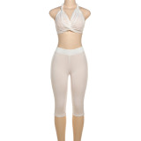 Hanging neck, exposed back, lace up vest, tight fitting cropped pants two-piece set