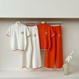 Two piece set of letter spliced zipper cardigan, short sleeved knitted wide leg pants