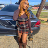Tight fitting sleeveless vest plaid dress