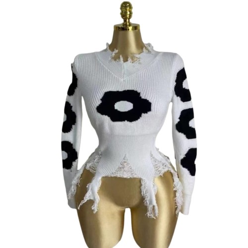 Cross hole tassel long sleeved loose fitting pullover knitted sweater