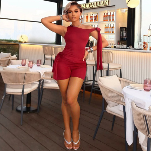 Slant collar sleeveless top with lace up shorts two-piece set