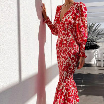 V-neck fishtail dress with waist cinch and figure-hugging silhouette