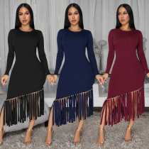 Solid color round neck fringed hem dress