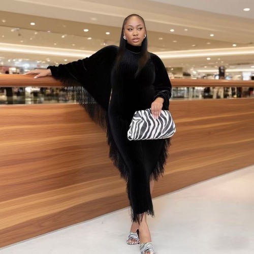 Knitted tassel dress with high neck, bat sleeves, and split hips