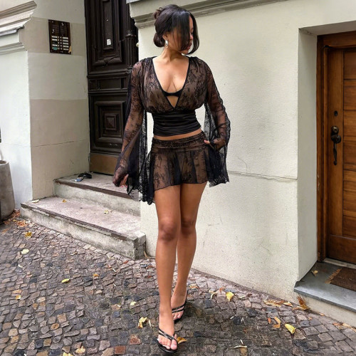 V-neck waist cinched top, hip hugging short skirt, lace patchwork set