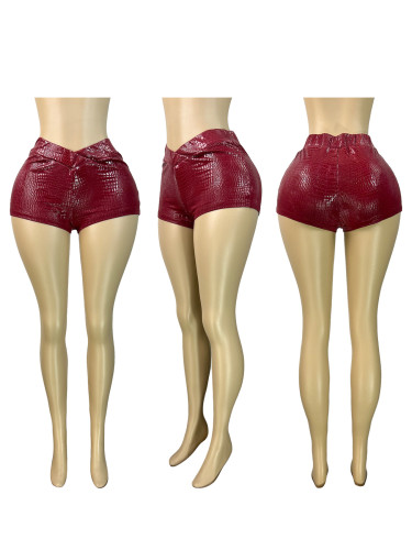 Hot stamping elastic leather wrapped hip shorts