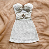 Hollow-out metal decorative camisole and hip-hugging skirt