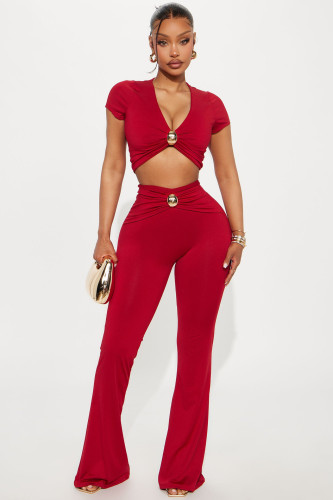 Low cut V-neck short sleeved T-shirt top with hardware waist and hips, long pants set