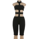 Hollow out tight fitting neck hanging jumpsuit