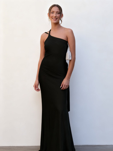 Sleeveless diagonal collar dress with exposed back and hollowed out waist cinching long skirt