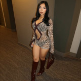 Open cut printed see through jumpsuit with exposed navel