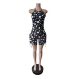Sleeveless polka dot printed jumpsuit with drawstring shorts