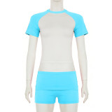 Shoulder cut color short sleeved top, shorts, headband, sports suit
