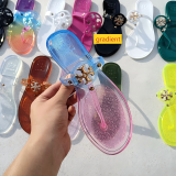 Transparent jelly flip flops with herringbone design