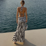 Backless, neck tied, slit cut, black fungus edge dress