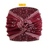 Printed headband, sports makeup, tied hair, crossed wide edge headband