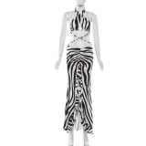 Backless, neck tied, slit cut, black fungus edge dress