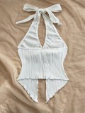 Tie up metal buckle, asymmetrical hem vest with a snug fit