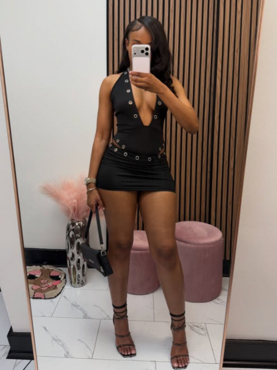 Deep V hollow metal hanging neck top, hip hugging short skirt set