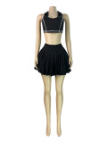 Two piece set of collared tank top lined with safety pants and pleated short skirt
