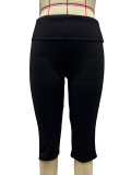 Chest hugging top and mid length pants