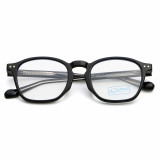 Folded front view of classic black TR90 optical frames showing compact design