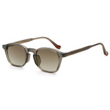 Angled view of Crystal Champagne sunglasses with gradient brown lenses.
