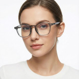 Female model wearing transparent grey vintage round eyeglasses (Color C2)