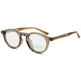 Vintage-inspired transparent tea color optical eyewear with adjustable wire core temples.