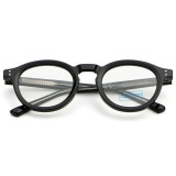 Top-down view of classic round optical eyeglasses with anti-blue lenses.