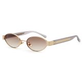 Premium gold oval eyewear with gradient brown lenses and clear temples
