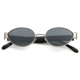 Top-down view of silver frame oval sunglasses folded, highlighting the sleek design and high-grade finish.
