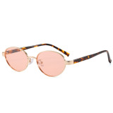 Stylish gold round metal sunglasses with light pink tinted lenses