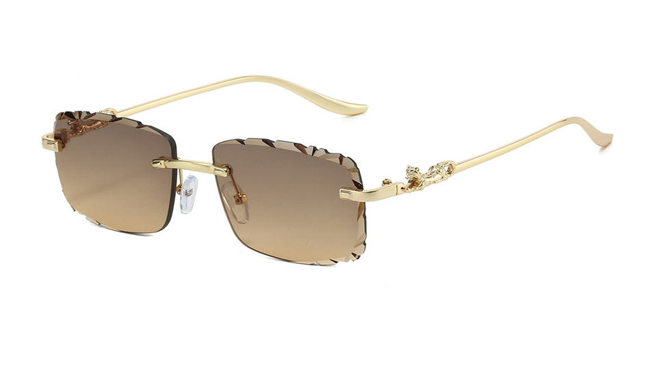 Grey-brown lens rimless sunglasses with gold-tone panther temples