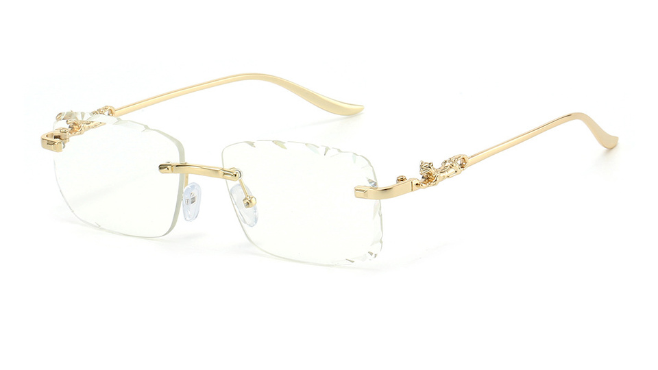 Clear lens rimless glasses with gold-tone panther temples