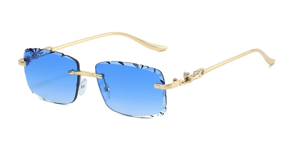 Gradient blue rimless sunglasses with gold-tone panther temples
