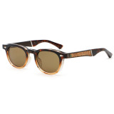 Round sunglasses in tortoise amber frame with brown lenses