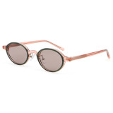 Oval sunglasses in pink frame with dark green rim and grey lenses