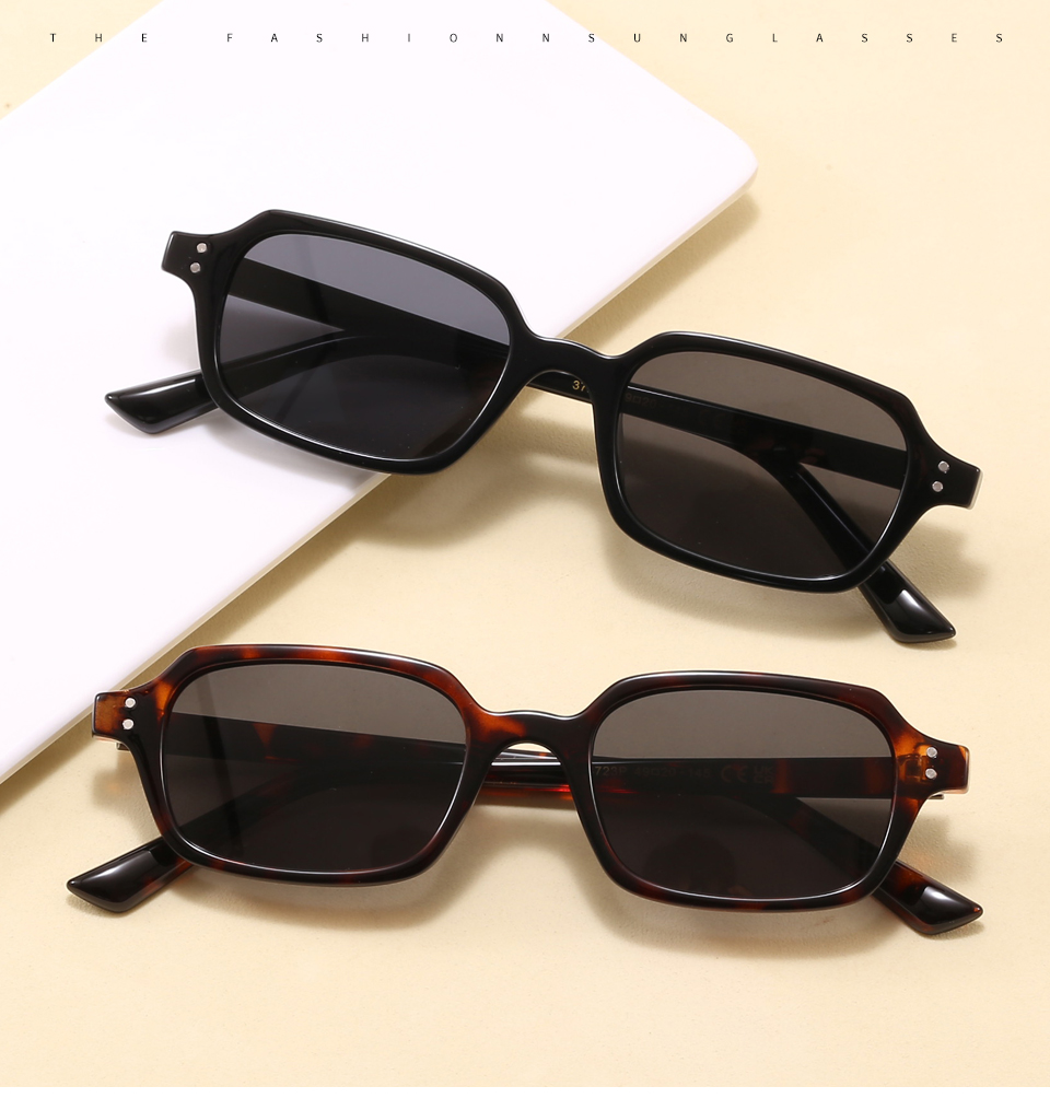Two colorways of narrow rectangular polarized sunglasses arranged in a product scene