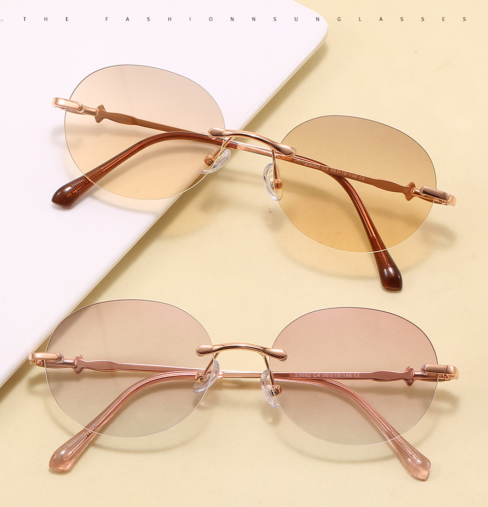 Two folded pairs in a styled tabletop display, showing the frame profile and lens colors.
