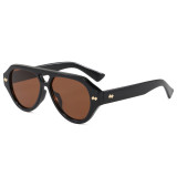 Black oversized flat-top aviator sunglasses with brown lenses and gold diamond accents