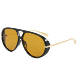 Black frame aviator sunglasses with gold temples and amber yellow lenses