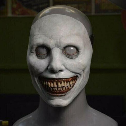 Creepy Halloween Smiling Demon Face
